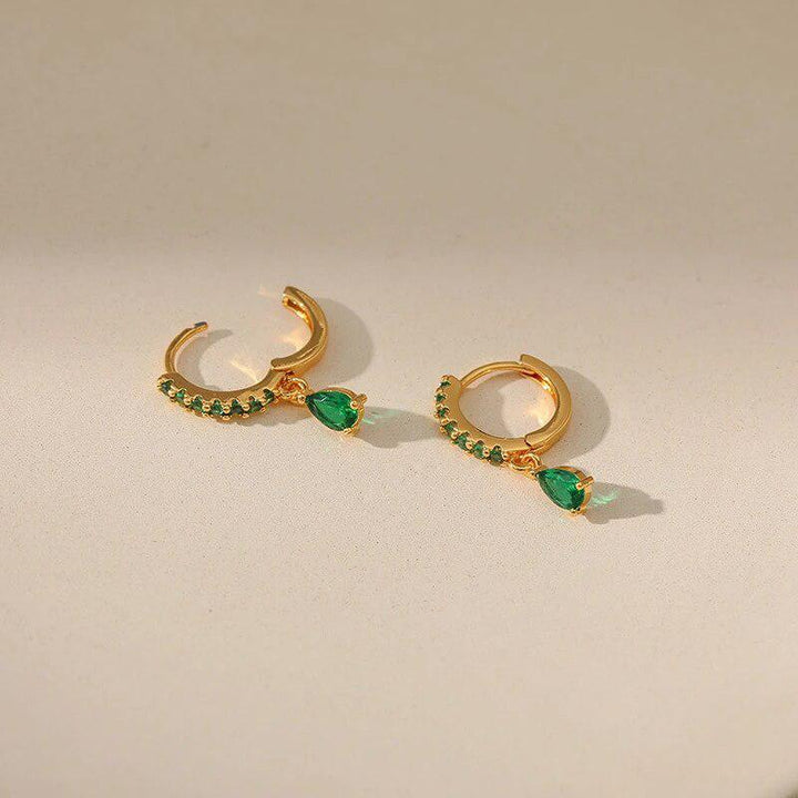 Zirconia earrings with emerald in gold